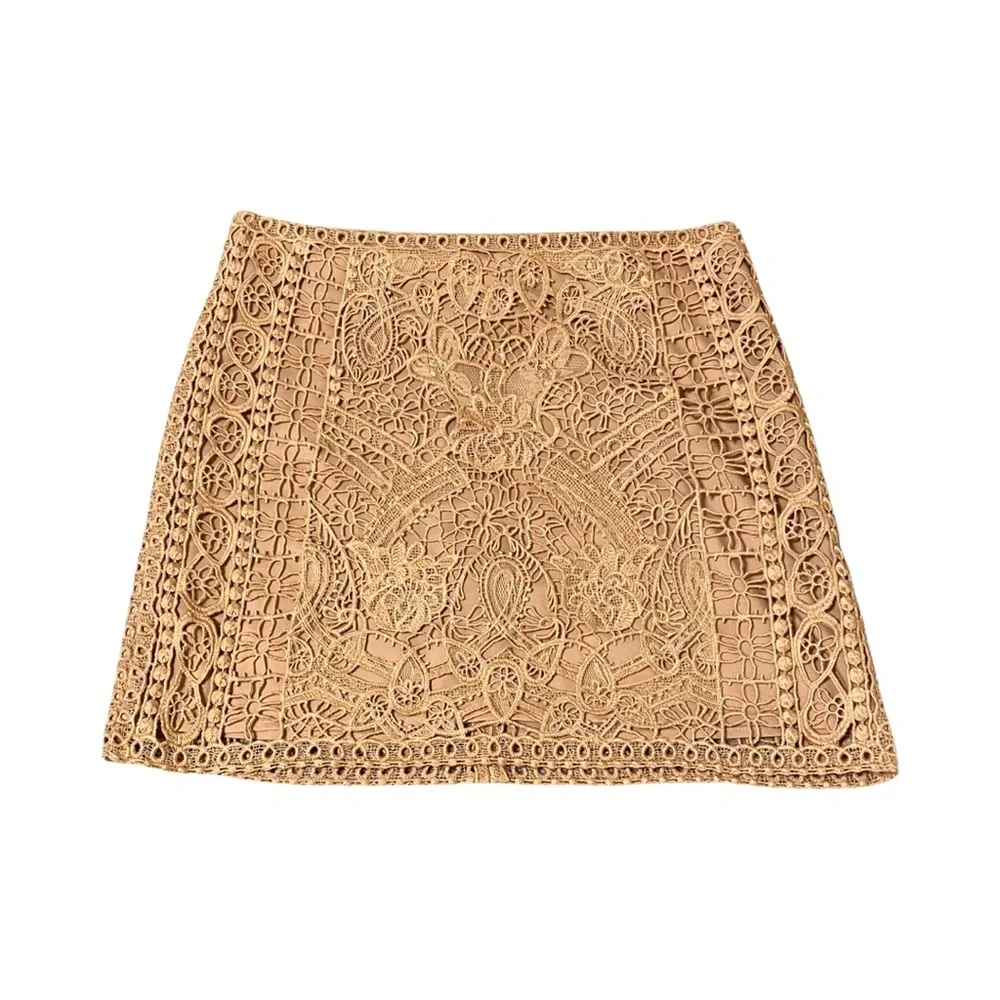 Club Monaco lace overlay mini skirt. - Picture 1 of 7